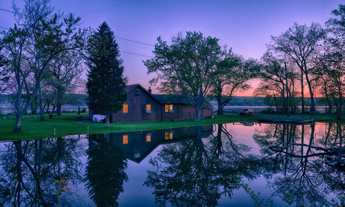 Lansing House | Almost an island in Cayuga Lake! Private & panoramic 650' of level lake frontage