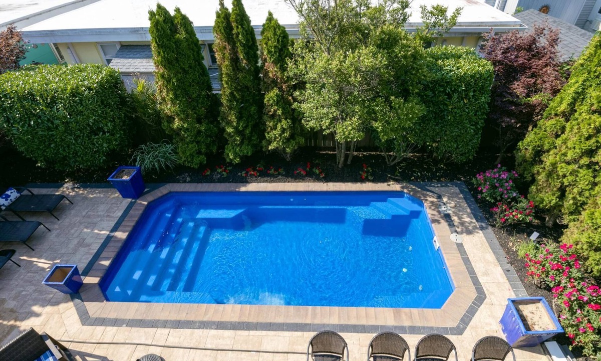 Rehoboth by the Sea Villa | "Beach Block! Pool, Roof Deck, 7BR/6BA, Sleeps 16