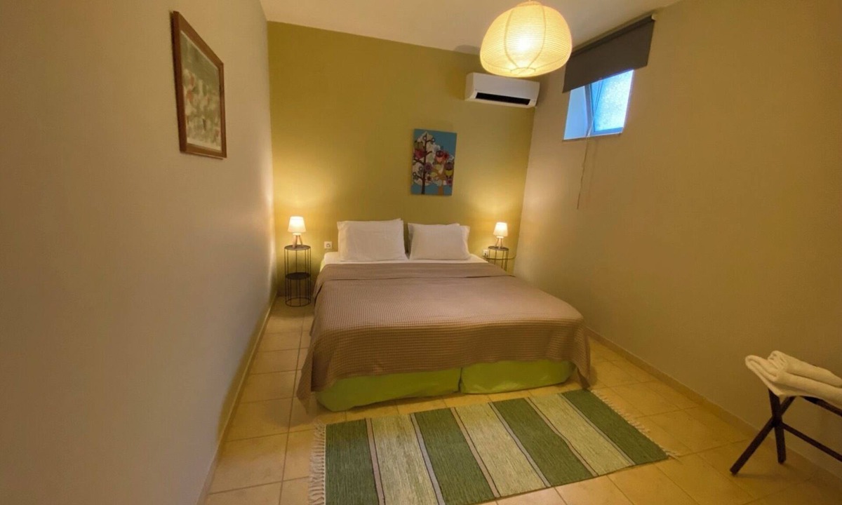 Stoupa Apartment | Beautiful Basement Apartment with Private Terrace