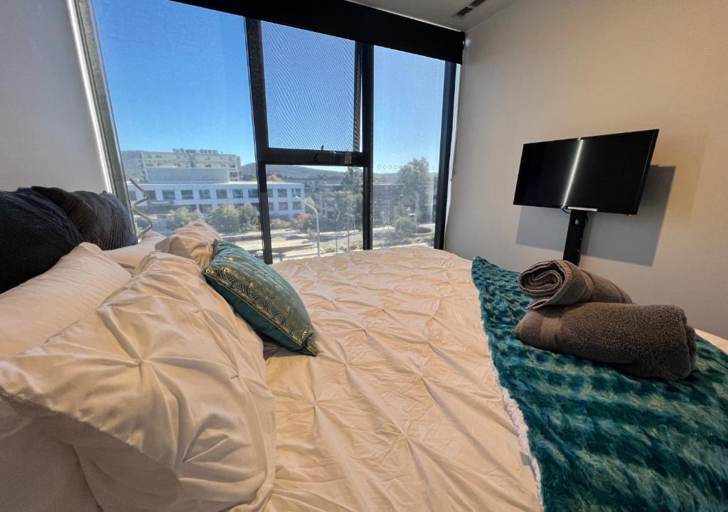 Braddon Apartment | Midnight Luxe 2BR 2Bath Apartment 408 in the heart of Braddon Pool Sauna L4 Views Secure Parking Wine WiFi