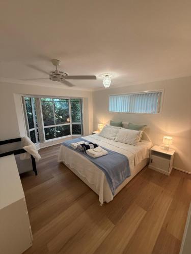 Bongaree House | Pet Friendly - Plunge Pool Canal Sunset View - Private Jetty