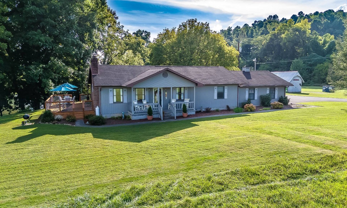 Elizabethton House | Riverfront home with dock, mountain view, grill, firepit, smart TVs