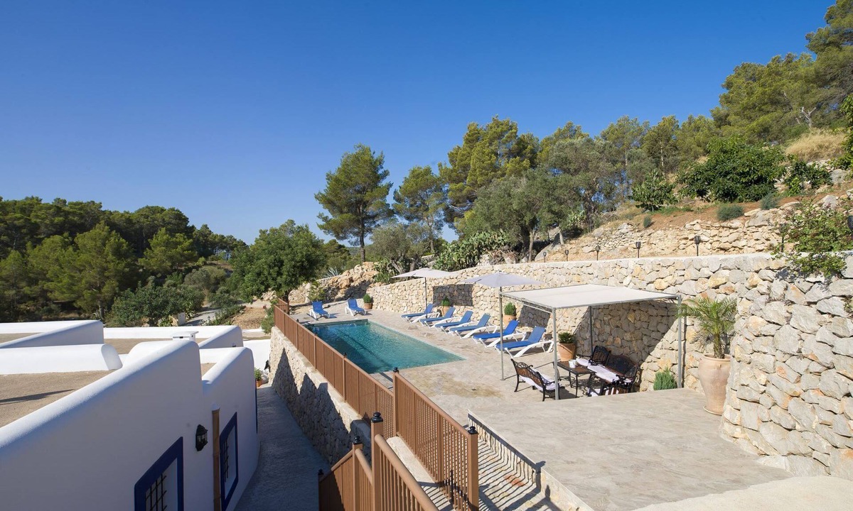 Sant Antoni de Portmany Cottage | Rural house with pool and view to the valley located in San Mateo, Ibiza