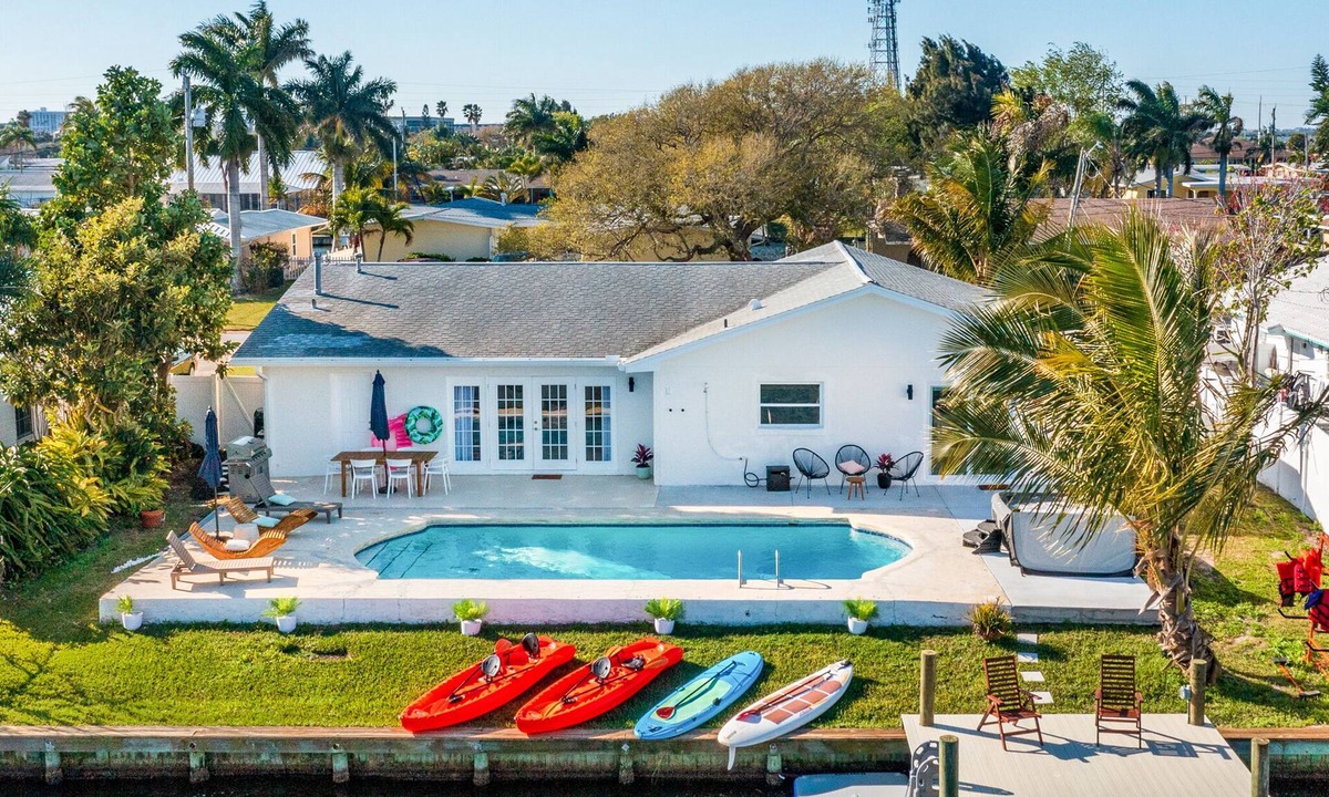 Venetian Way House | Waterfront Oasis 3B/3B Private Heated Pool, Hot Tub & Dock! 1/2 mile from Ocean!