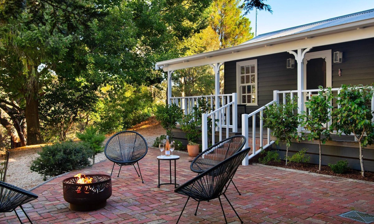 Daylesford House | Wrenwood Cottage 2 bedroom miners cottage with wood fire, 6 seater outdoor spa and 2 person indoor s
