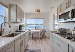 100' of Water Front * 3 Houses * 7 Parking * AC