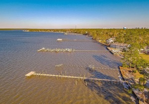 Bay View Condo with WiFi, Balcony, AC, W/D, Seasonal Outdoor Pool, & Boat Dock