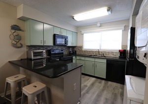 Riverside Condo with access to beach and bay!