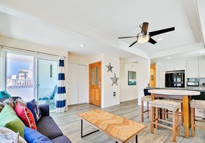 Spacious condo just steps to sand & central location with sundeck & views