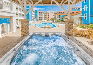 Updated condo with balcony & pools - steps to the beach