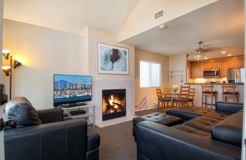 West Newport Condo | Enjoy Ocean Views from the Large Roof-Top Deck Adjacent to the Newport Pier!