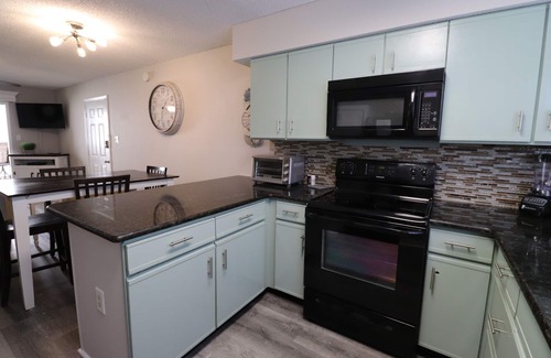 Orange Beach East Condo | Riverside Condo with access to beach and bay!