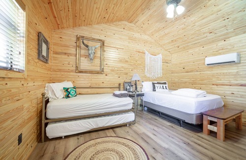 Ramer House | 1bd rm, 1 bth, hotel style cabin w/Mini fridge, micro, & tv, at Kick Back Ranch