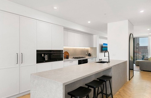 Kiama Apartment | 3BR Coastal Escape with Ocean Views, Shared Pool & Jacuzzi, 2 Car Spaces & Walk to Surf Beach