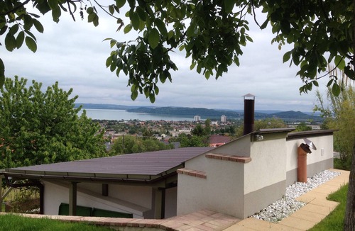 Balatonfured House | A newly renovated old wine cellar with a view of Lake Balaton and the city.