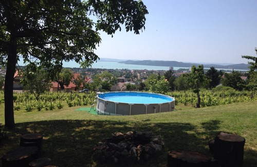 Balatonfured House | A newly renovated old wine cellar with a view of Lake Balaton and the city.