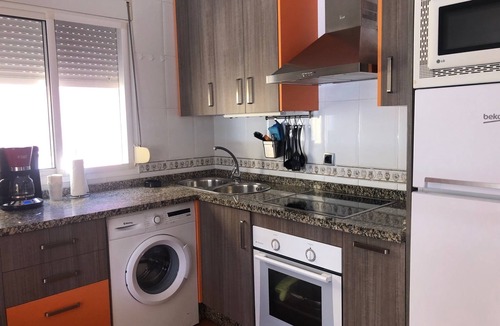 Playas del Palo Apartment | Apt. 1st line beach. Large terrace with sea views. El Palo Promenade.