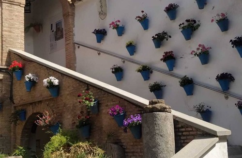 Distrito Sur House | At the foot of the Roman Bridge