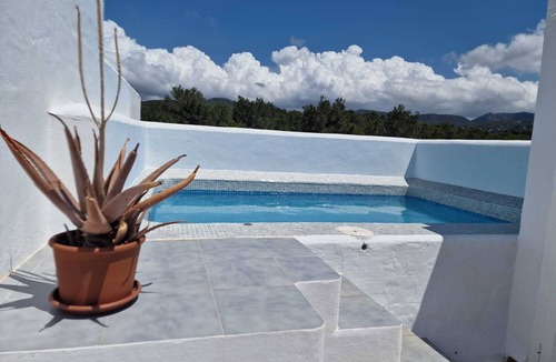 Sant Josep de sa Talaia Apartment | Authentic Mediterranean penthouse with sea view and private pool