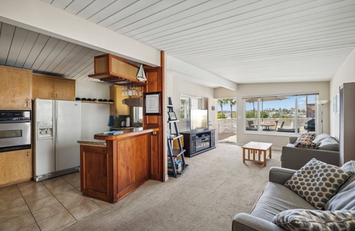 Balboa Peninsula Apartment | Backyard Beach! 50 Steps to the Sand with Bay Views and Ocean Blues