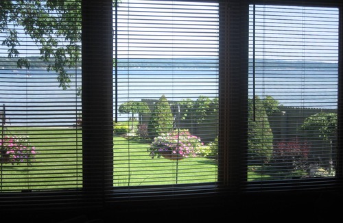 Auburn Apartment | Beautiful log sided, on Owasco Lake w/private beach, entrance and parking.