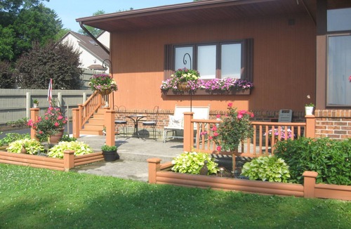 Auburn Apartment | Beautiful log sided, on Owasco Lake w/private beach, entrance and parking.