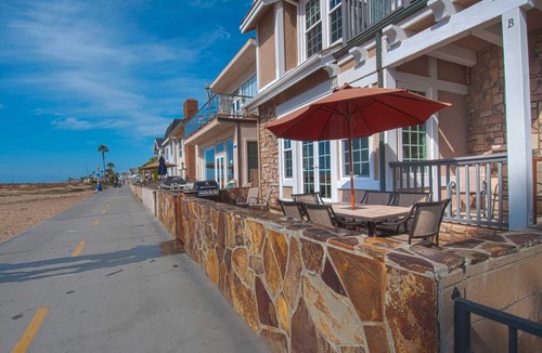 Newport Beach Condo | Breathtaking, unique & highly upgraded lower unit right on the Balboa Boardwalk!