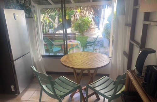 Temae House | Bungalow in shared garden with house, seafront and private beach.
