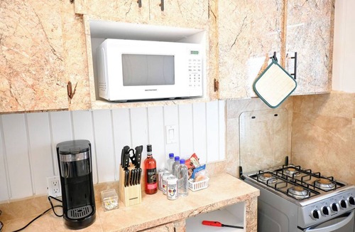 Rock Sound Apartment | Charming 1BR w/A/C, WiFi + Free Drinks & Snacks