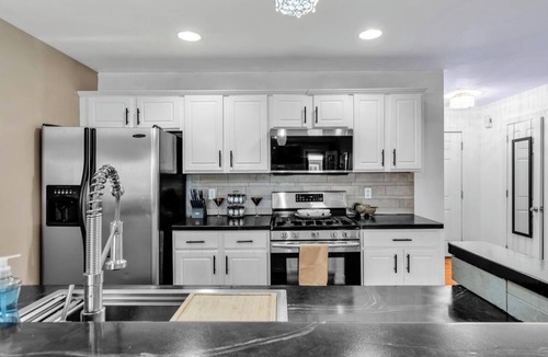 Blasdell House | Clean,Cozy &Updated Home with Jacuzzi, Fenced in yard, BarShed, Firepit & MORE!