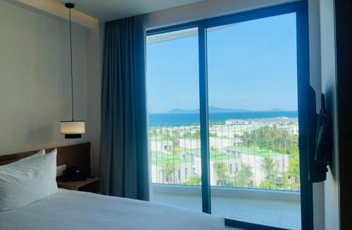 Dien Duong Apartment | Coastal Vibe - Resort 2BR apartment Pool & Beach