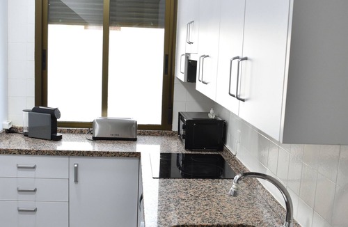 La Trinidad-San Juan y Todos los Santos Apartment | Downtown Apartment with Parking and Terrace