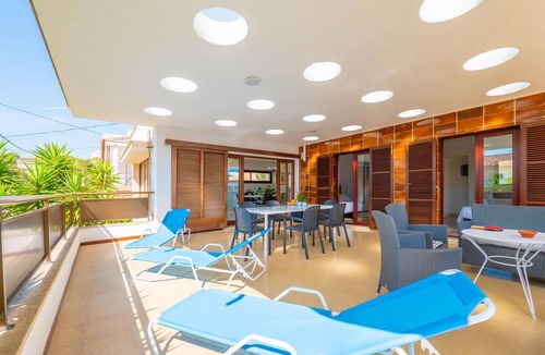 Can Picafort House | ELIANTO - Wonderful beach house near the sea with several furnished terraces perfect to en