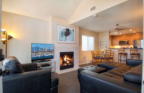 West Newport Condo | Enjoy Ocean Views from the Large Roof-Top Deck Adjacent to the Newport Pier!
