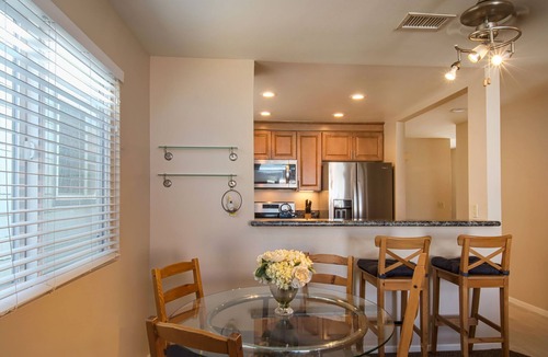 West Newport Condo | Enjoy Ocean Views from the Large Roof-Top Deck Adjacent to the Newport Pier!