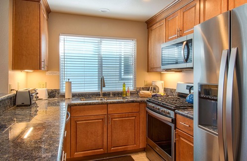 West Newport Condo | Enjoy Ocean Views from the Large Roof-Top Deck Adjacent to the Newport Pier!