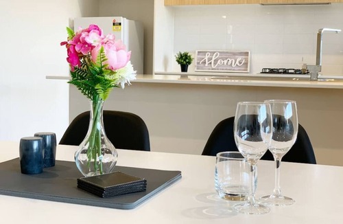 Woodville North House | Feel happy and at home here. No stairs. Modern designer space. Heating and cooling throughout. Secure double garage. Keyless entry. Free child friendly amenities. No parties, for quiet residential use only.