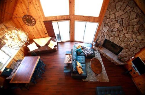 Blue Jay Ski Chalet | Glimmer Chalet Treetop A-frame cabin lake view