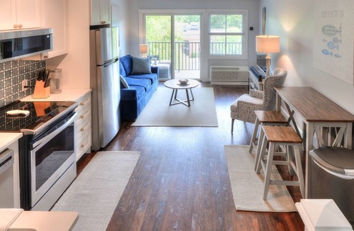 The Pines Condo | Gorgeous renovated property in town & walking distance to the beach & shops