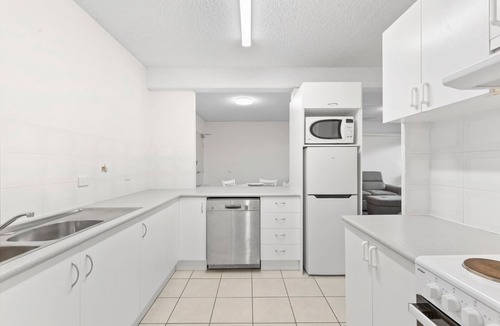 Coffs Harbour Apartment | Ground floor quiet garden balcony heated pool @223