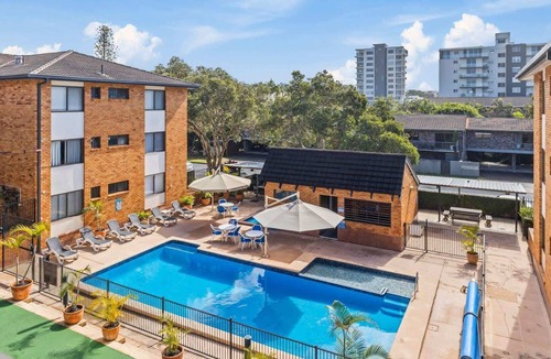 Coffs Harbour Apartment | Ground floor quiet garden balcony heated pool @223