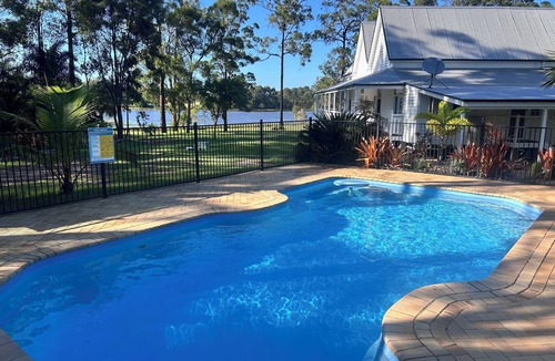 Burrum River House | House Overlooking a Private 12 Acre Lake And Only 4 Minutes To The Beach