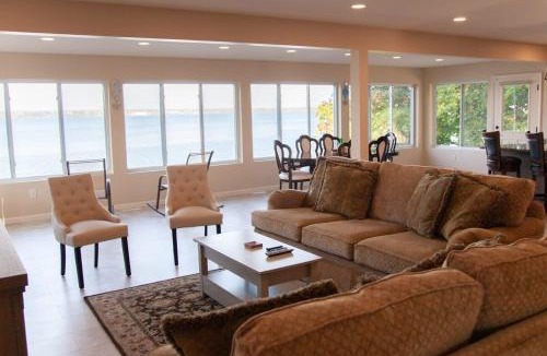 Geneva House | Lakeside Landing Dock Fire Pit and Boat Rental