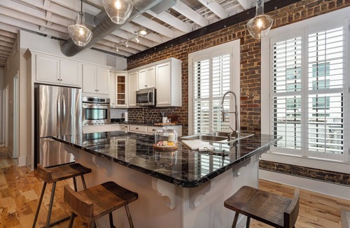 Central City Apartment | Luxury Penthouse with Private Deck and Indoor Parking