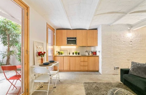 Poblenou Apartment | Patio 1BR Apartment in Brilliant Barcelona with AC