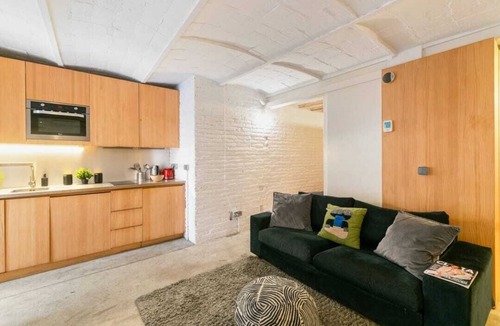 Poblenou Apartment | Patio 1BR Apartment in Brilliant Barcelona with AC
