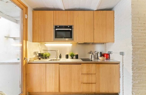 Poblenou Apartment | Patio 1BR Apartment in Brilliant Barcelona with AC