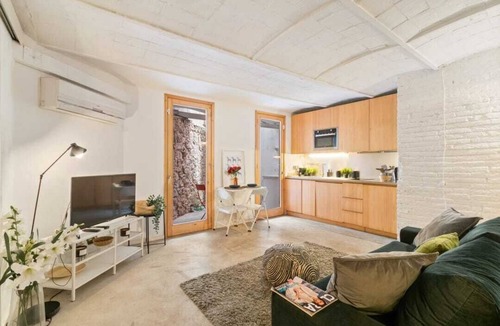 Poblenou Apartment | Patio 1BR Apartment in Brilliant Barcelona with AC