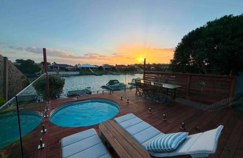 Bongaree House | Pet Friendly - Plunge Pool Canal Sunset View - Private Jetty