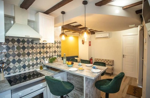 Miraflores de la Sierra Apartment | Recharge your batteries!Charming and cozy town house 7 minutes walk from the center and five from the river. Completely renovated in a retro style, preserving the natural stone and decoration brought from all over the world.Perfect to rest with great det